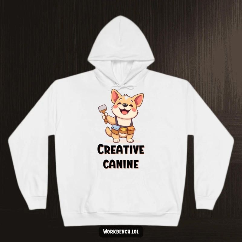 Funny hoodie featuring a playful dog wearing a tool belt, gleefully holding a paintbrush, symbolizing artistic endeavors and canine joy.
